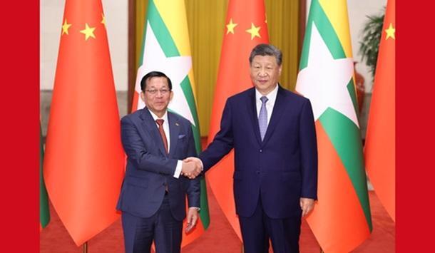 习近平同缅甸总统敏昂莱会谈
